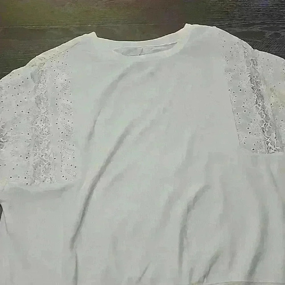 torrid Tops - Ivory shirt with lace sleeves. NWT Torrid size 0